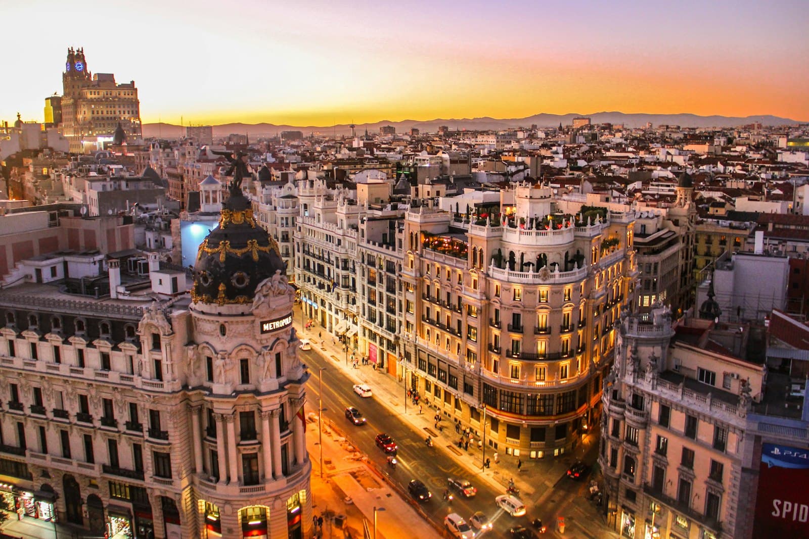 Barcelona — aerial photography of vehicles passing between high rise buildings