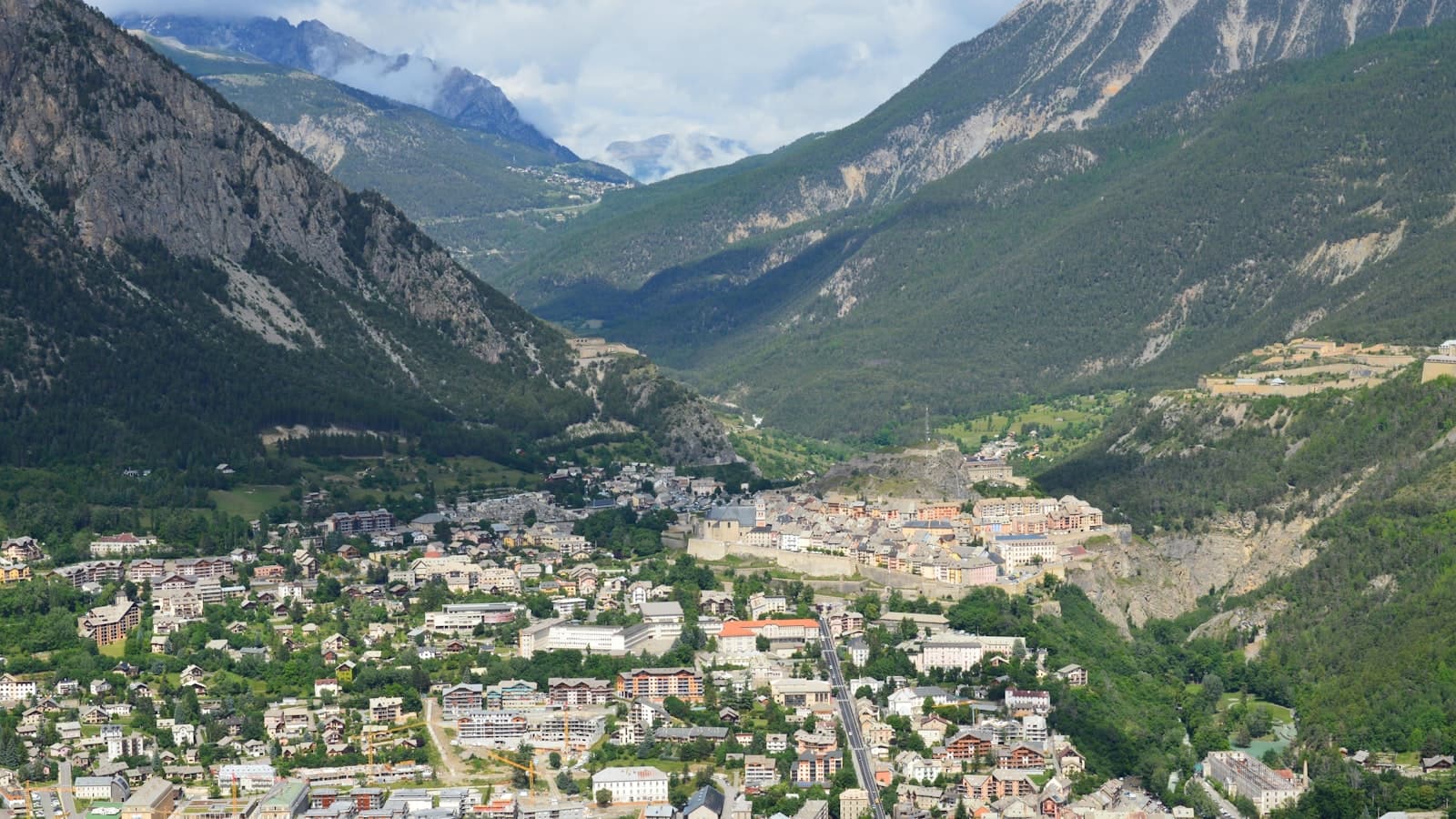 Briançon — A view of a city surrounded by mountains