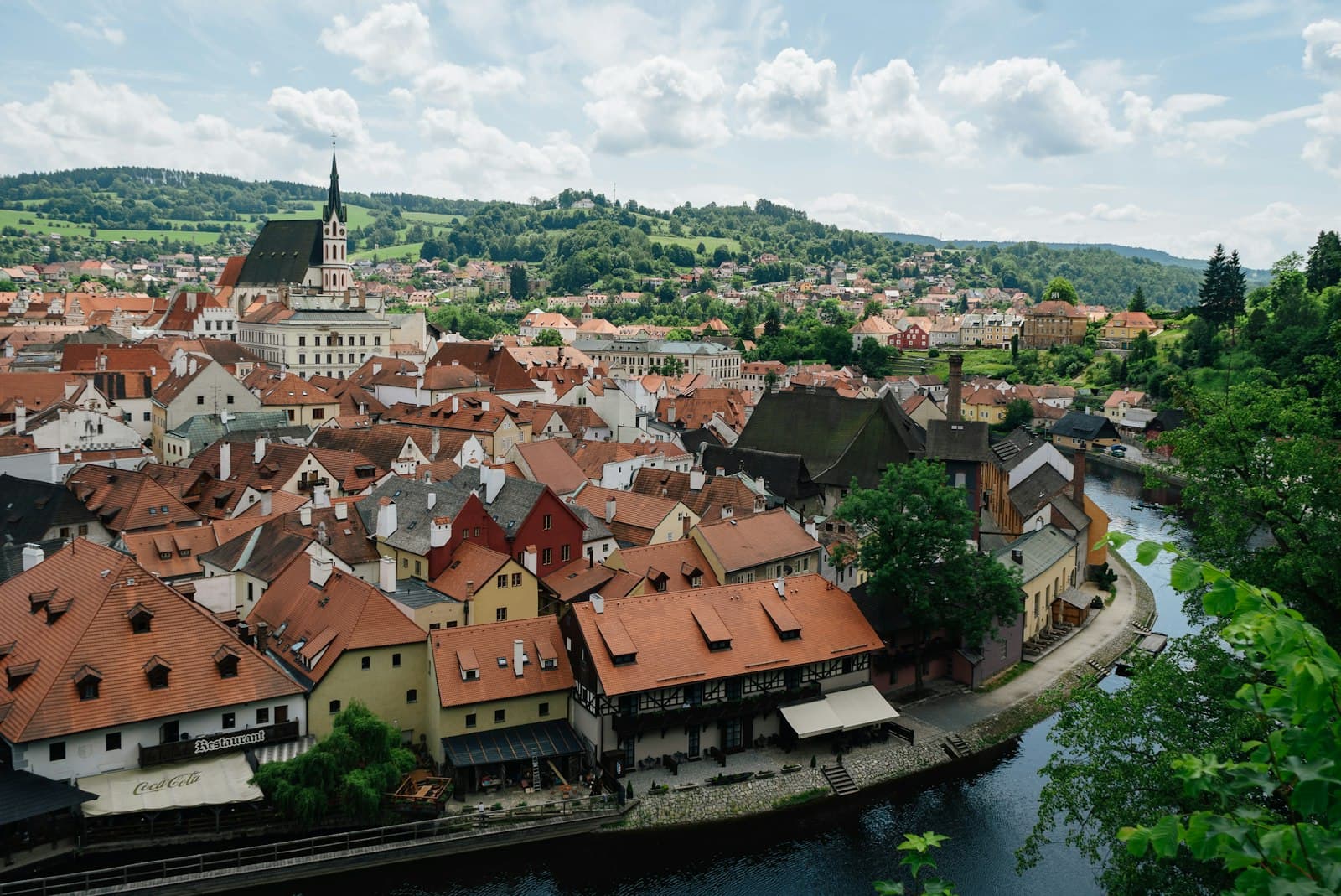 Český Krumlov — a view of a city with a river running through it