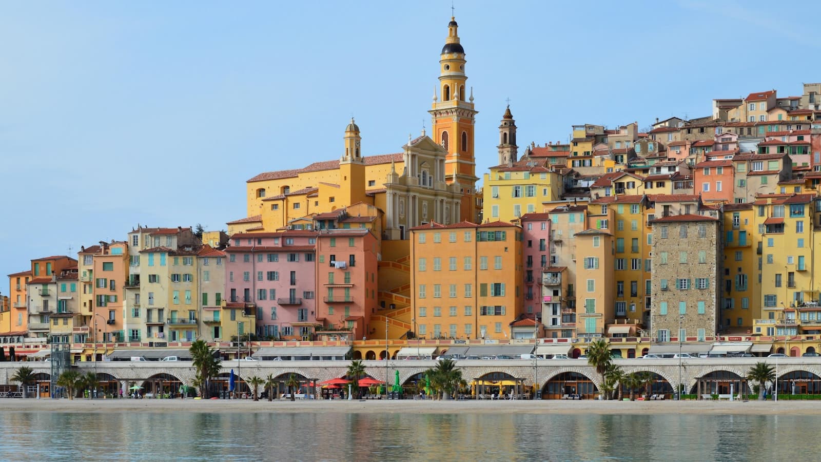 Menton — a group of buildings that are next to a body of water