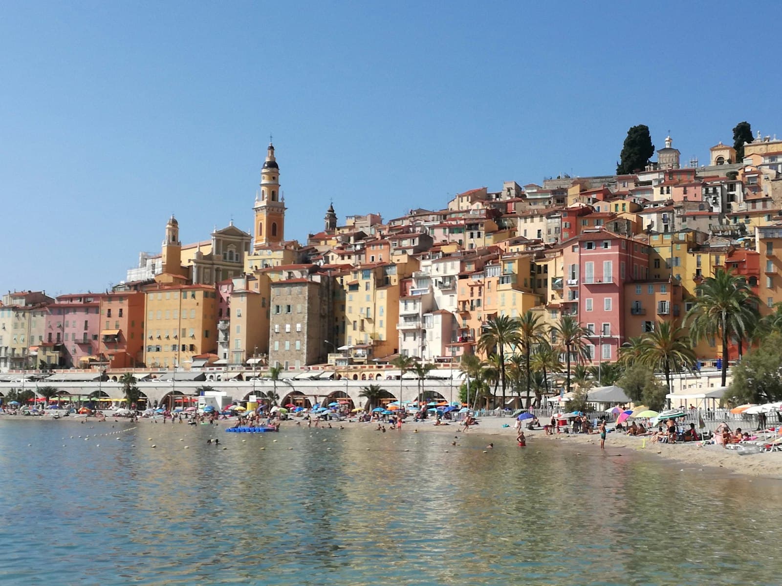 Menton — boats on water near buildings during daytime
